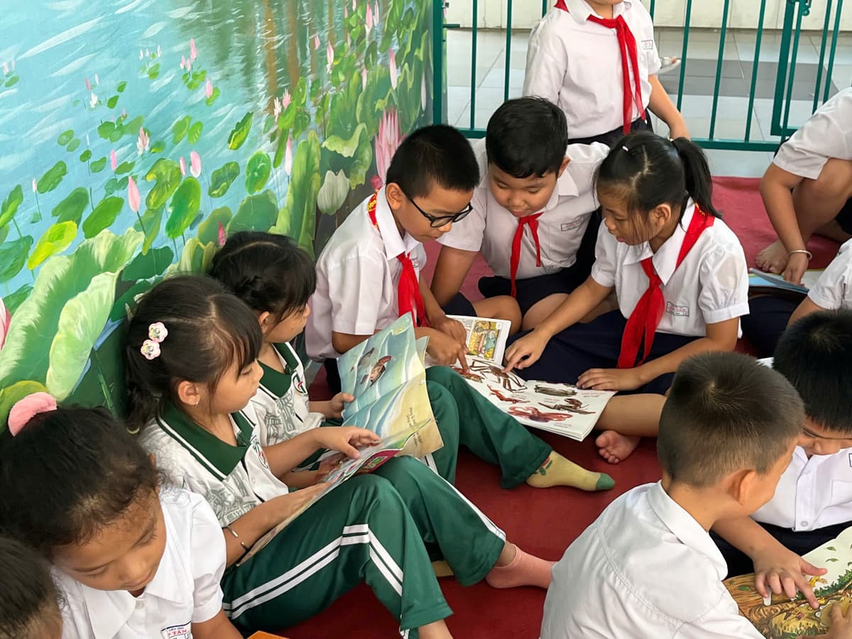 A student reading attentively at school